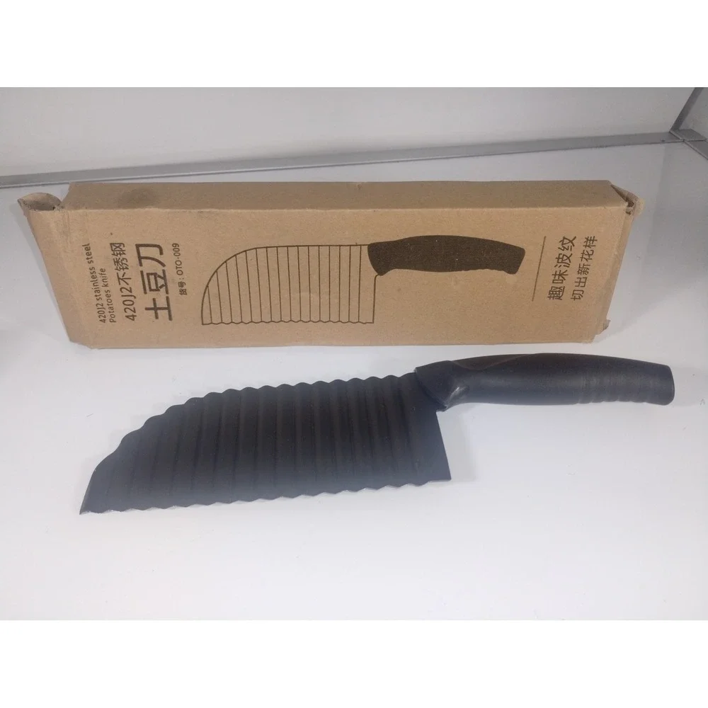 New in box potato knife black wavy